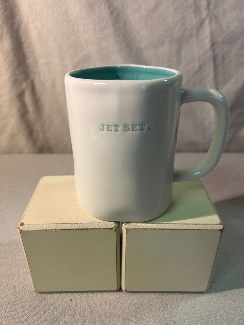 Rae Dunn White Exterior Mug with Teal Interior - "JET SET."